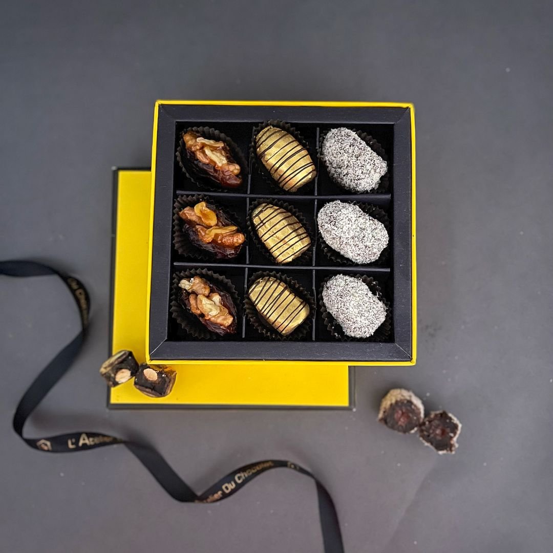 Luxury ADC dates box of 9 Mumbai featuring stuffed dates with nuts and chocolate for festive gifting occasions