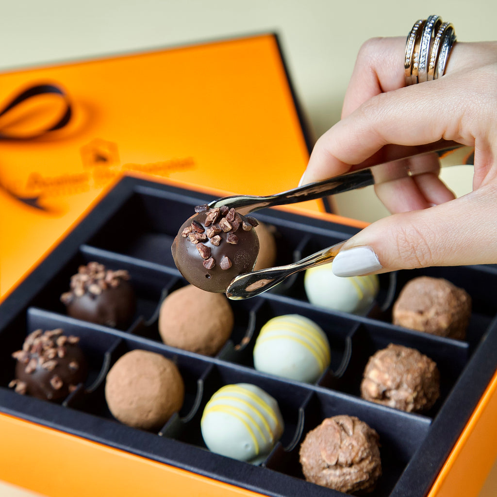 Buy 12 piece gourmet chocolate truffle box online in Mumbai with smooth textures and indulgent handcrafted flavors