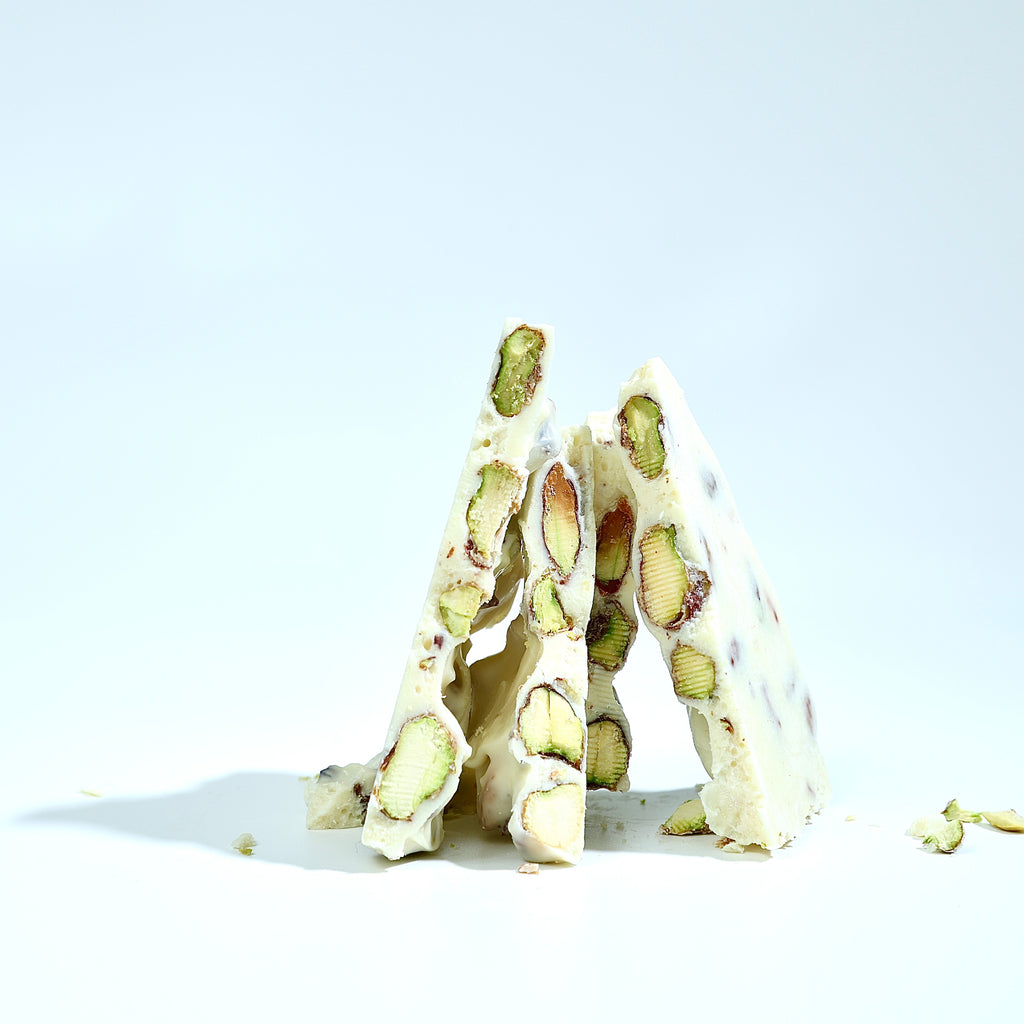Gourmet pistachio white chocolate bark 250 grams Mumbai crafted with rich cocoa butter and crunchy nut texture