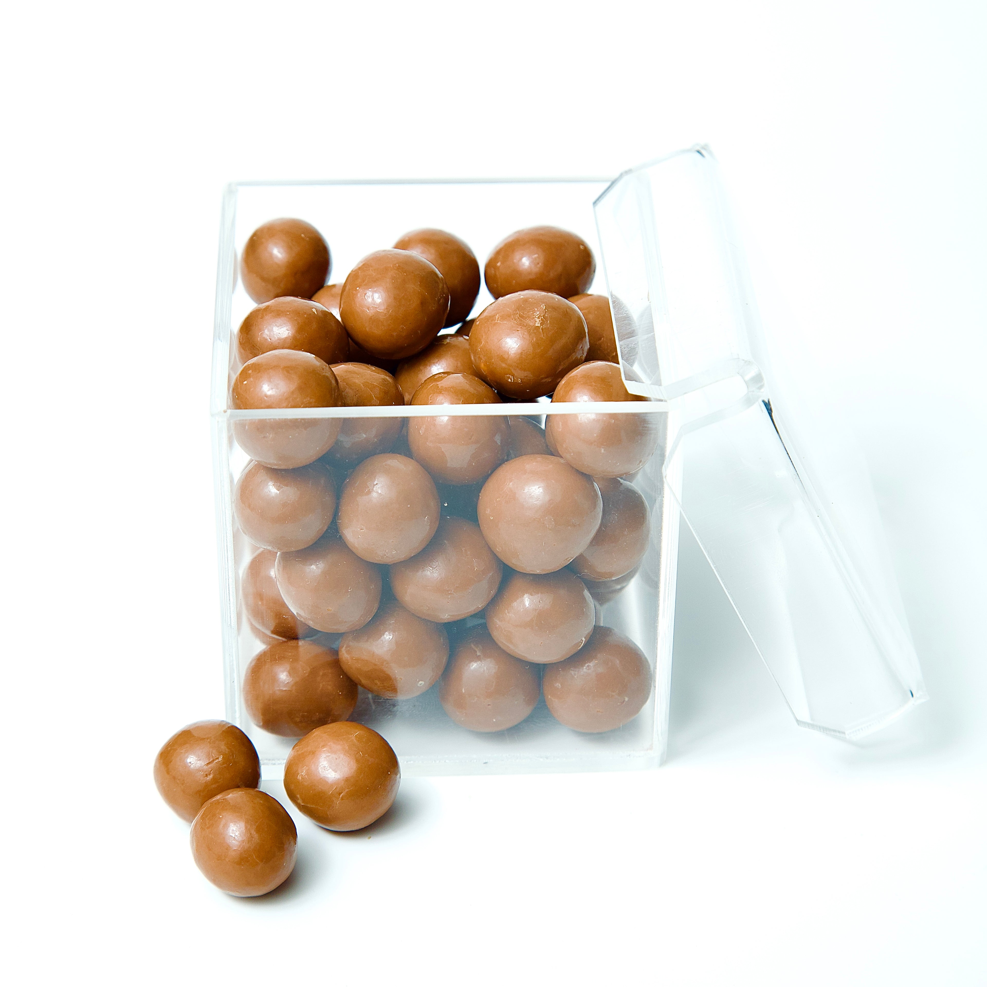 Buy milk chocolate dragees online in Mumbai with crisp nuts and silky couverture coating for indulgent treats